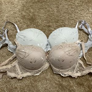 white and pinkish/tan push up bra bundle